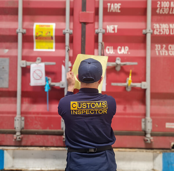 Customs officers carry out investigations on import and export goods in containers. Customs officers at the port seal and inspect the container doors.