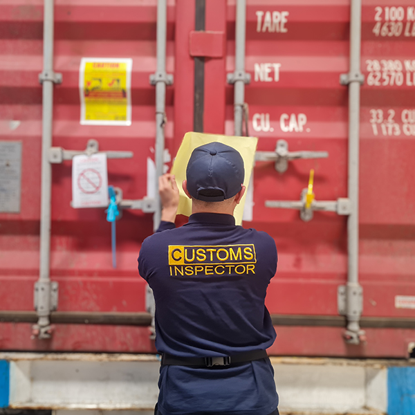 Customs officers carry out investigations on import and export goods in containers. Customs officers at the port seal and inspect the container doors.